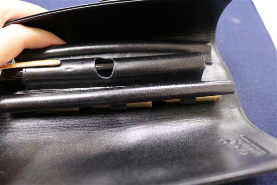 A Montblanc Meisterstuck black lacquered fountain pen, 14K gold nib, mint, in original leather pouch and box (1)